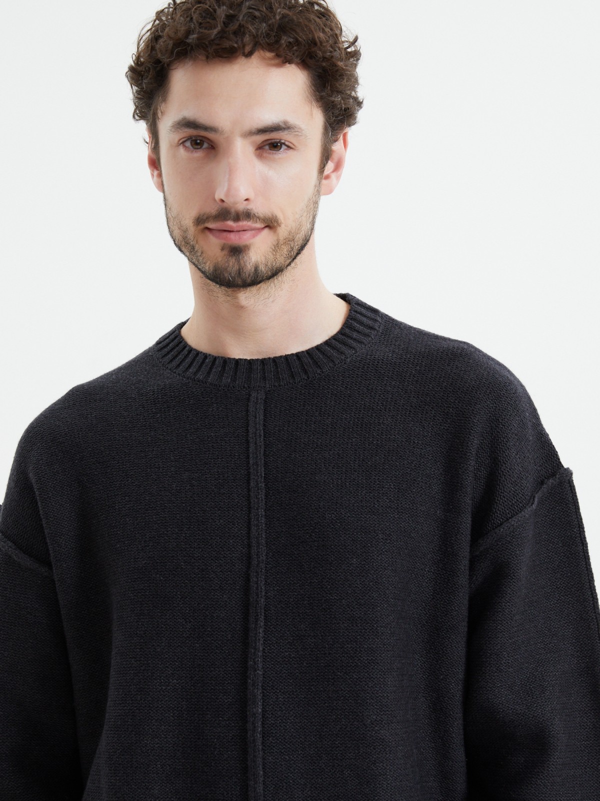 Вязаный джемпер с вывернутыми швами