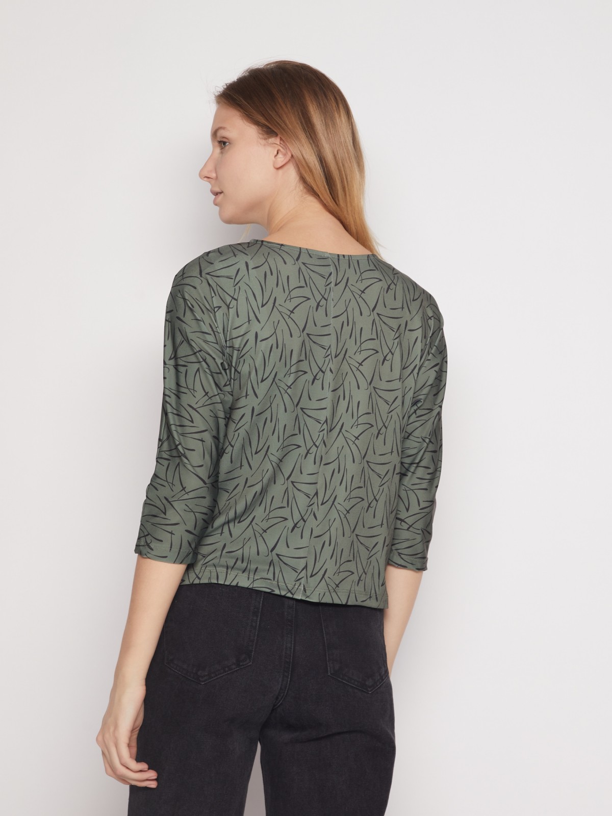 Трикотажная блузка с завязками