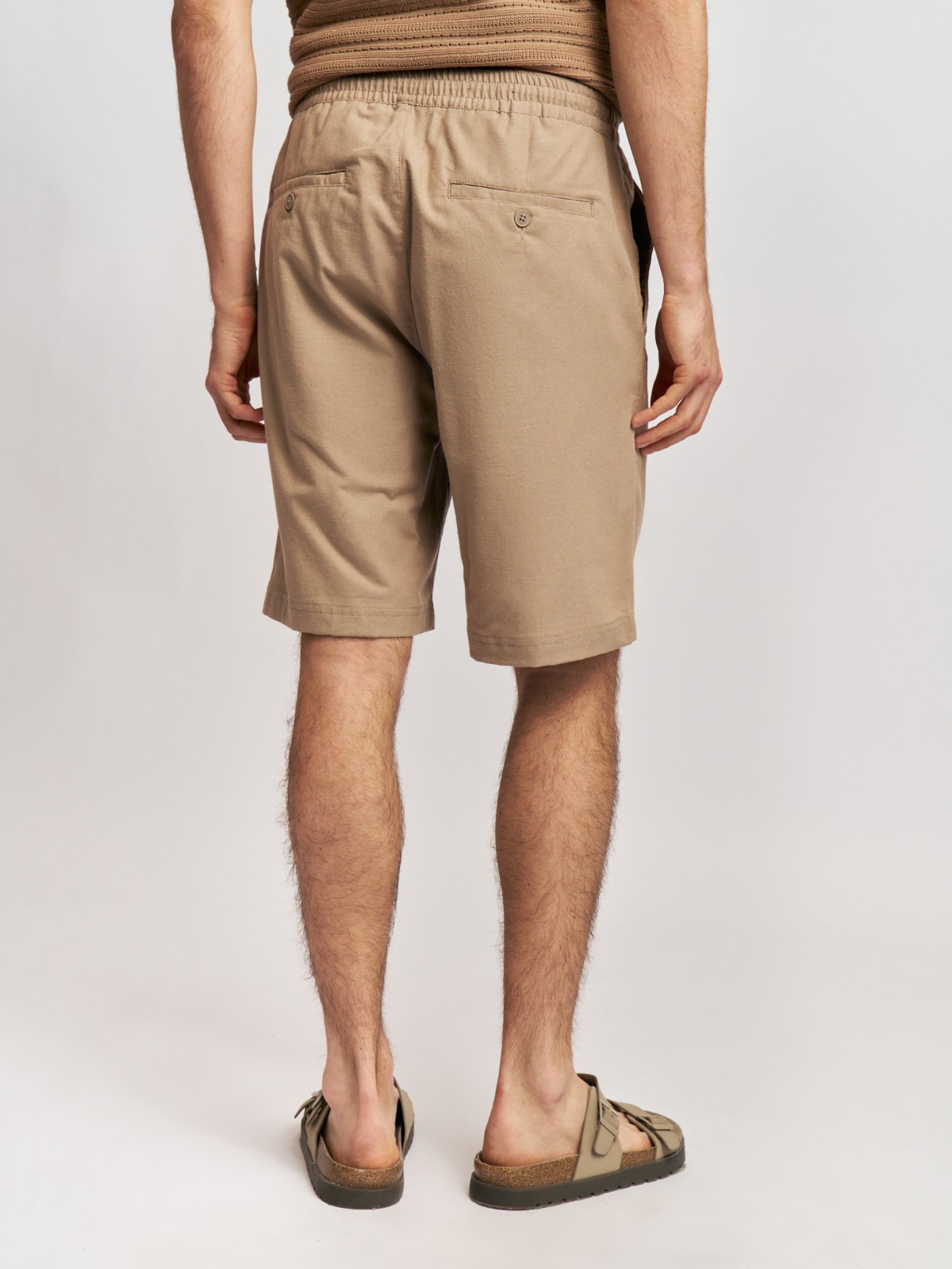 Удлинённые льняные шорты на резинке