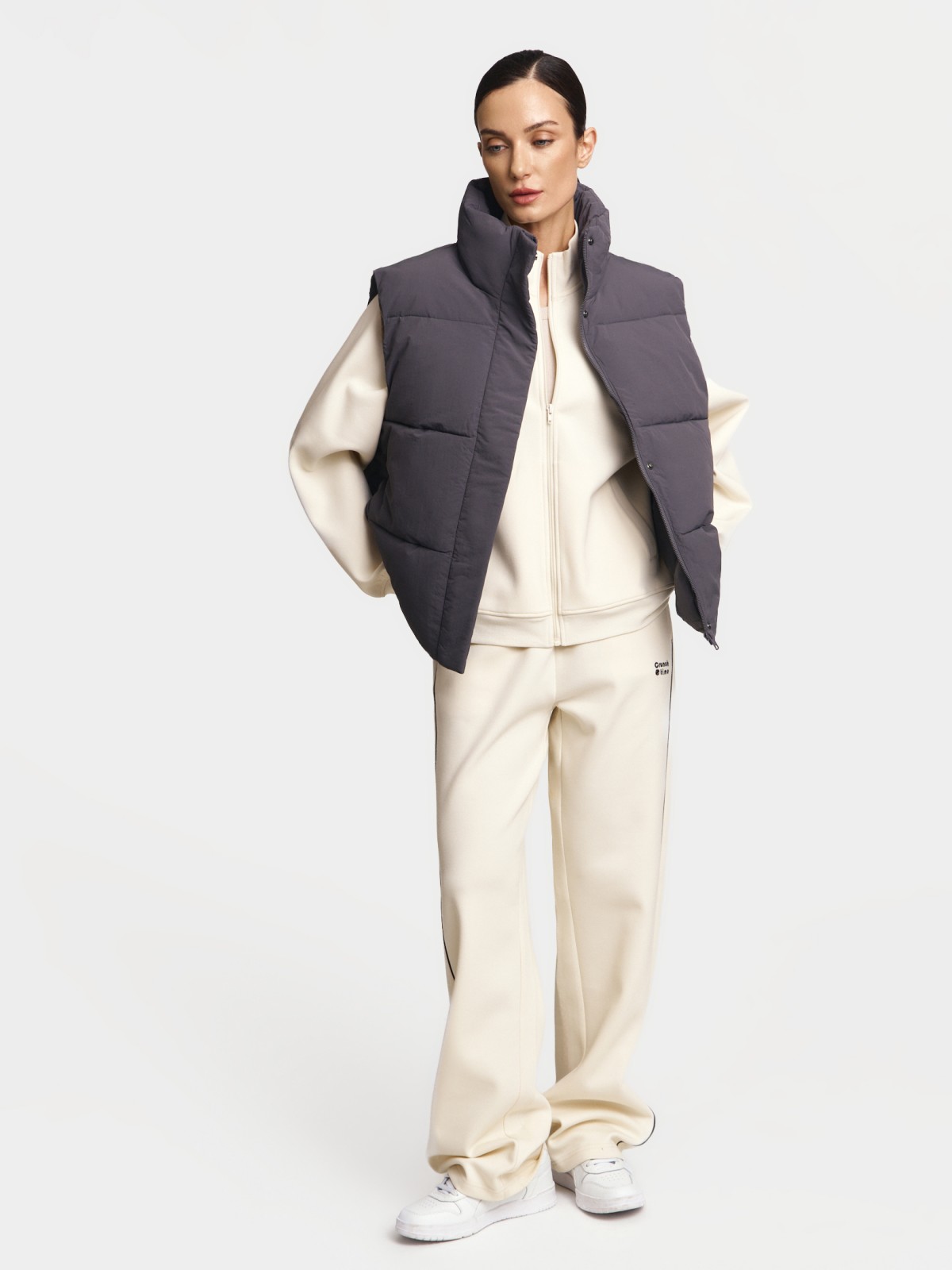 Тёплый стёганый жилет с горлом