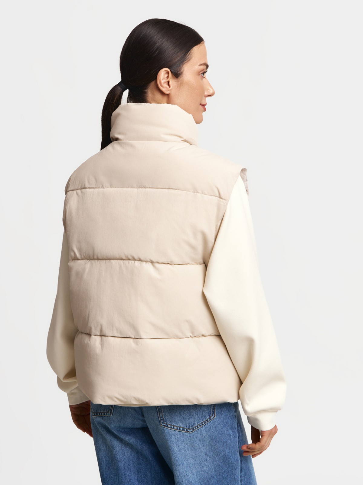 Тёплый стёганый жилет с горлом