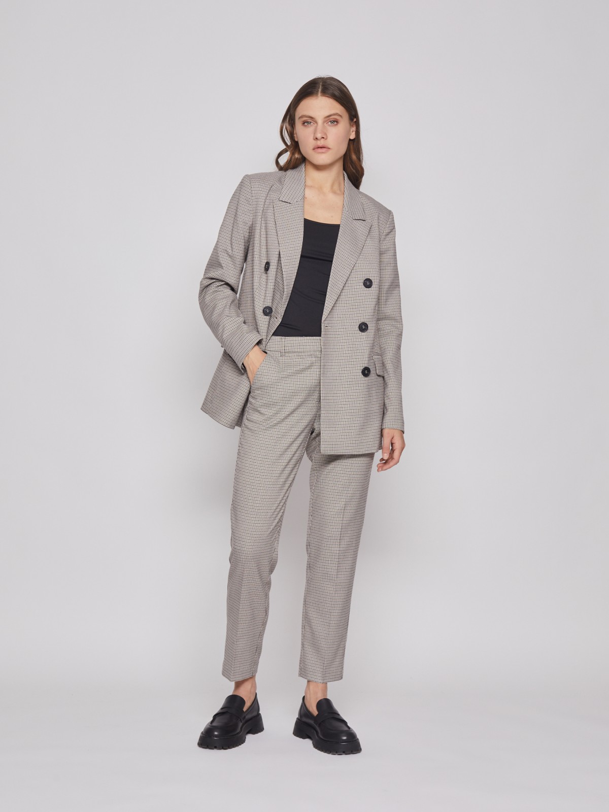 Зауженные брюки в клетку