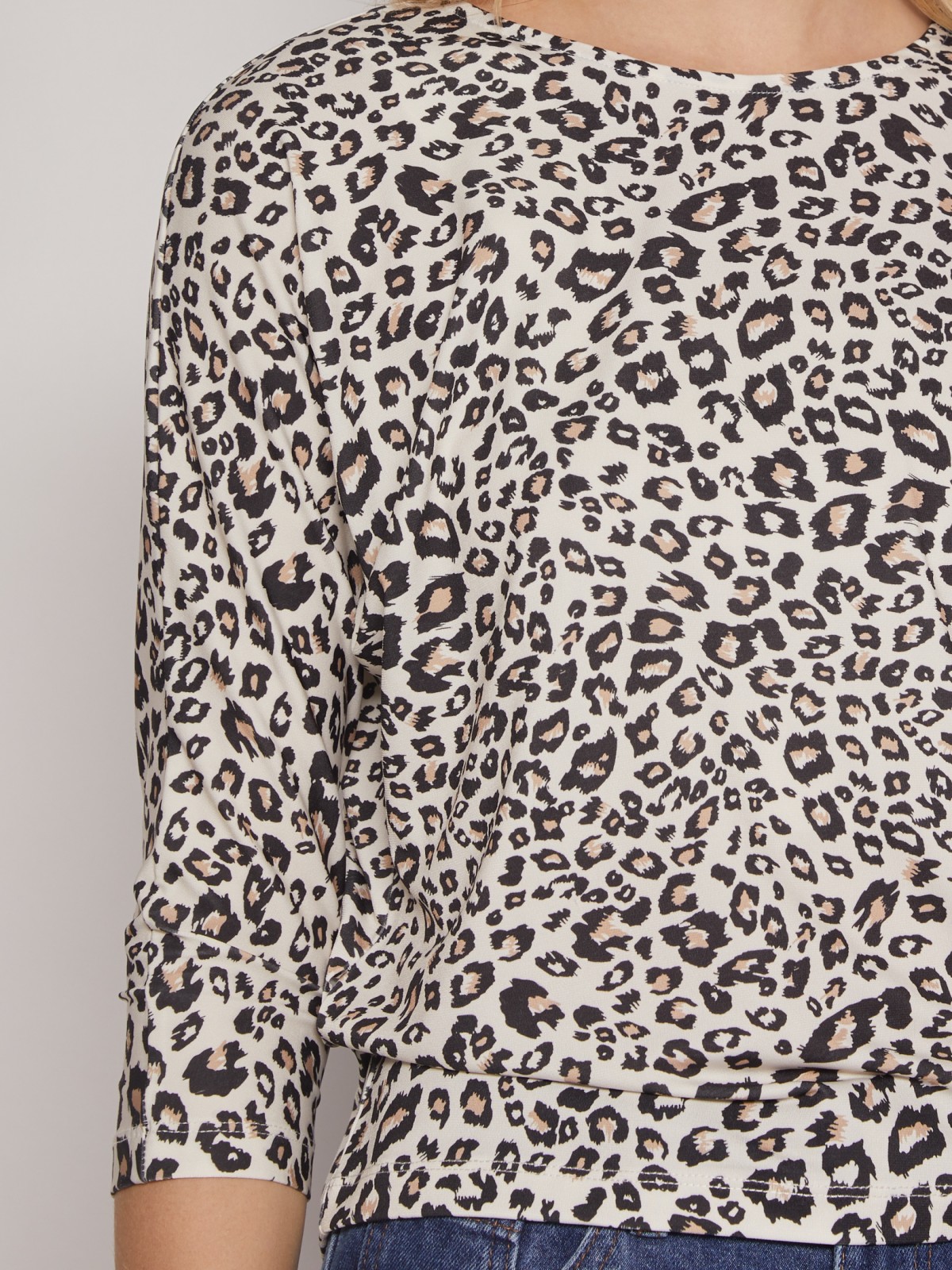 Трикотажная блузка с завязками