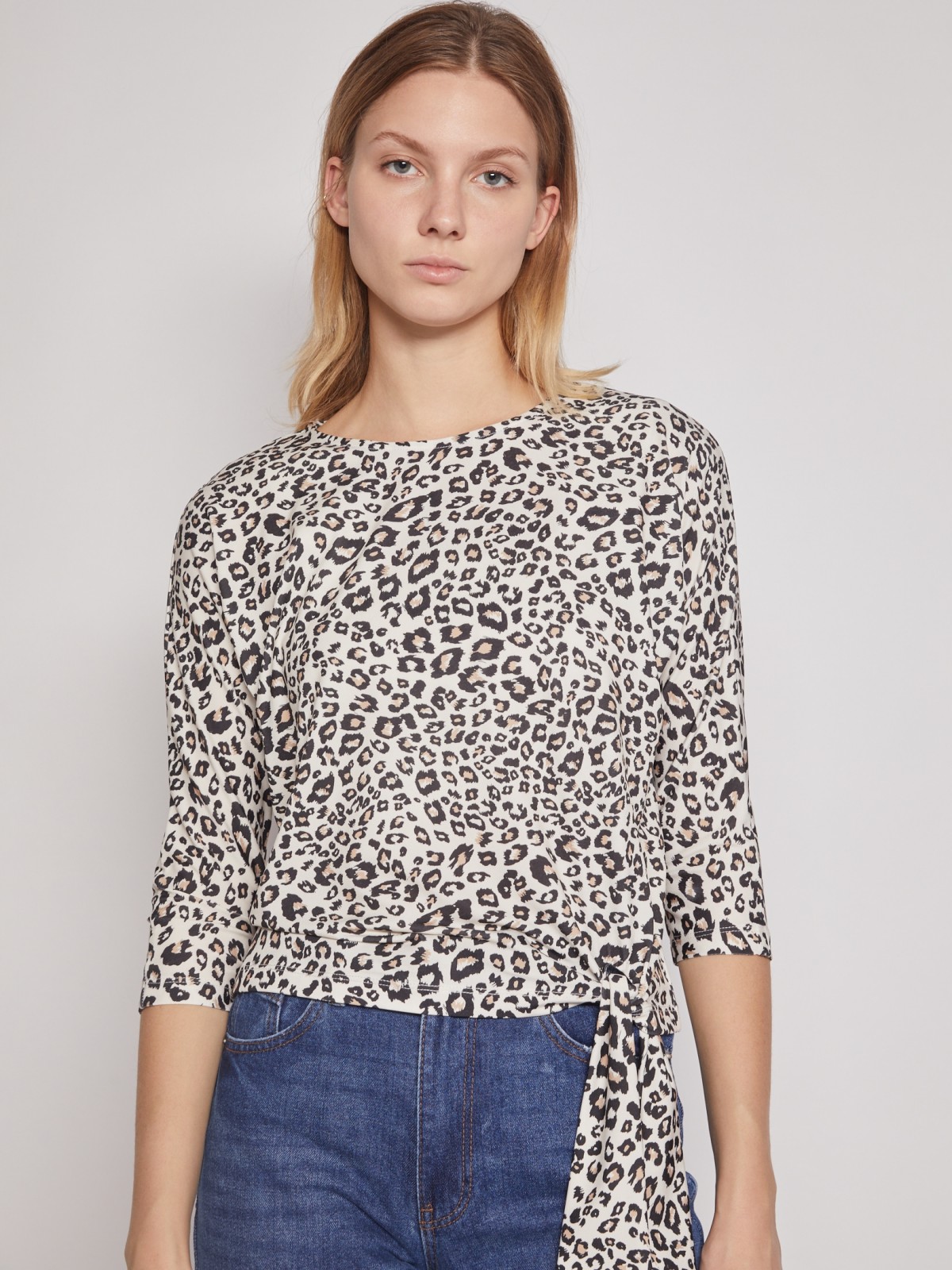 Трикотажная блузка с завязками