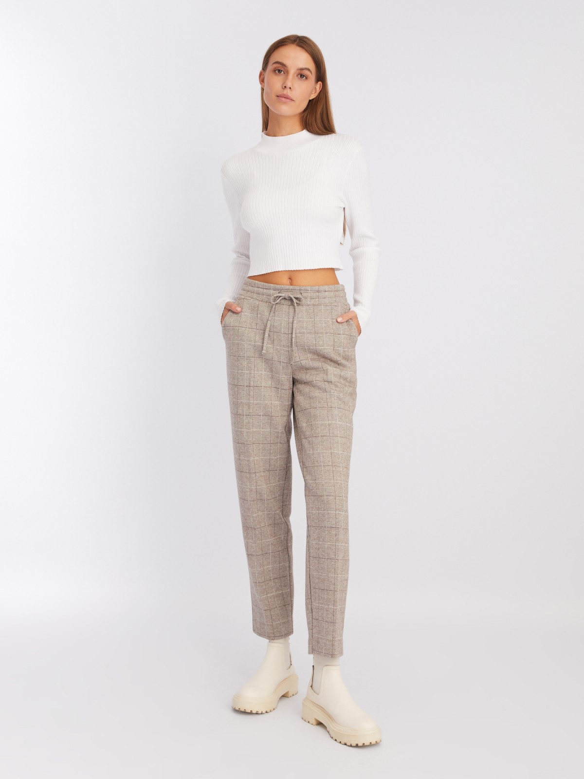 Утеплённые брюки-джоггеры на кулиске с узором в клетку