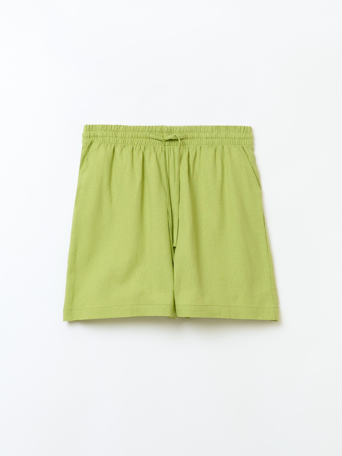 Льняные шорты на резинке с карманами 1199₽