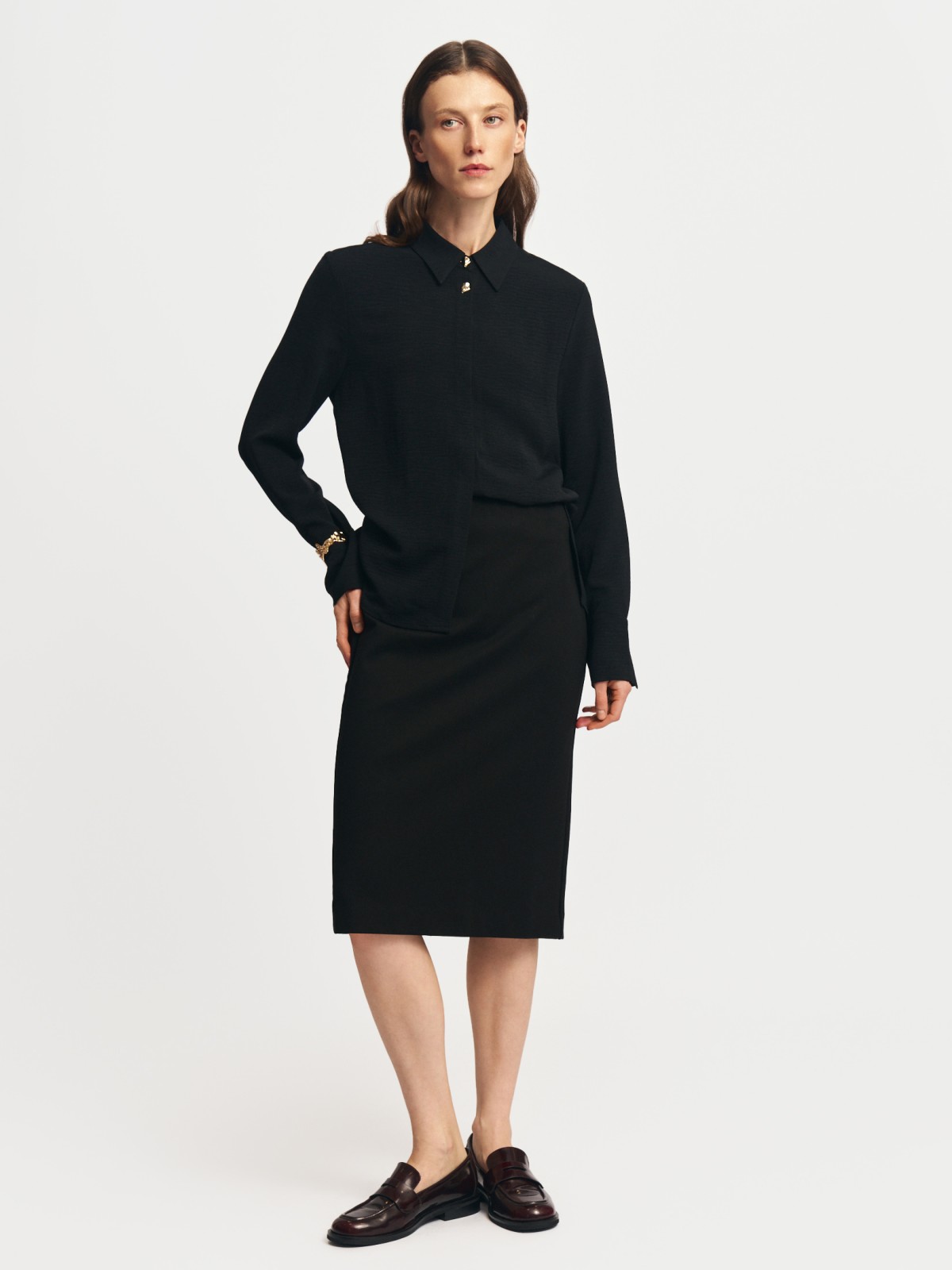 Трикотажная юбка-карандаш длины миди на резинке