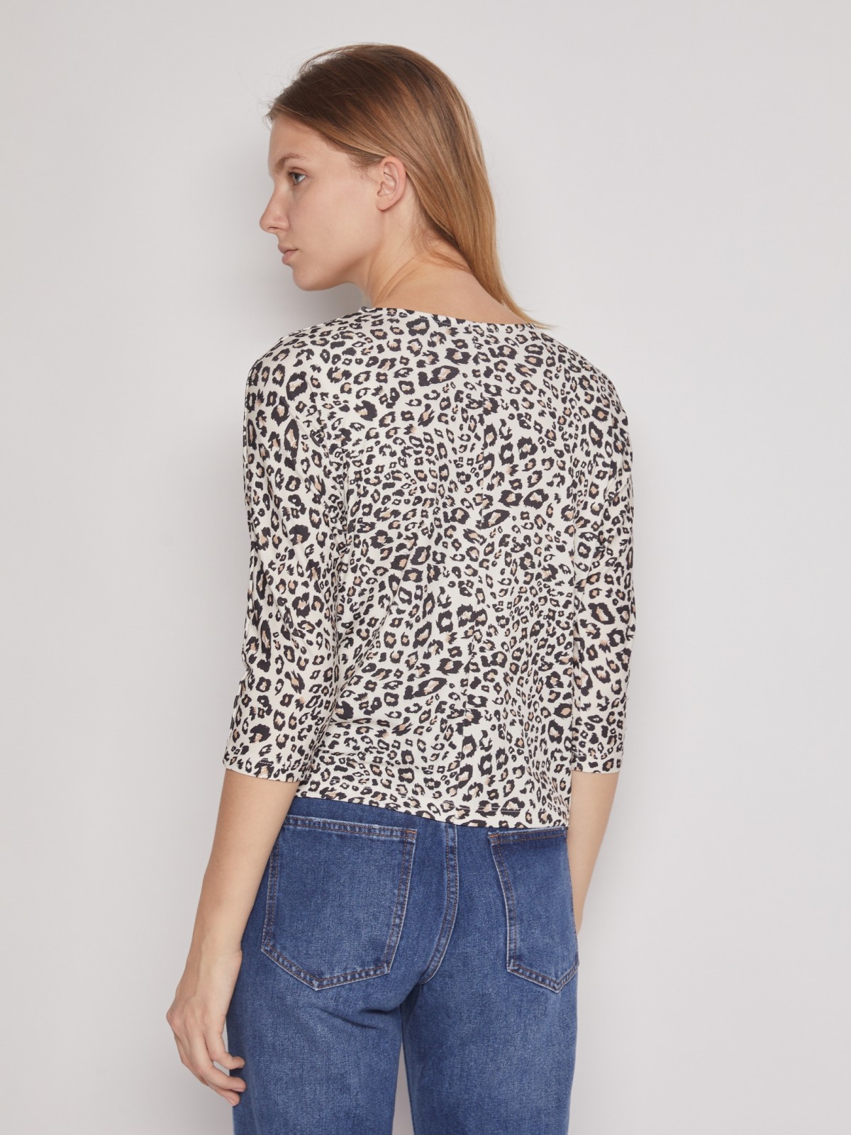 Трикотажная блузка с завязками