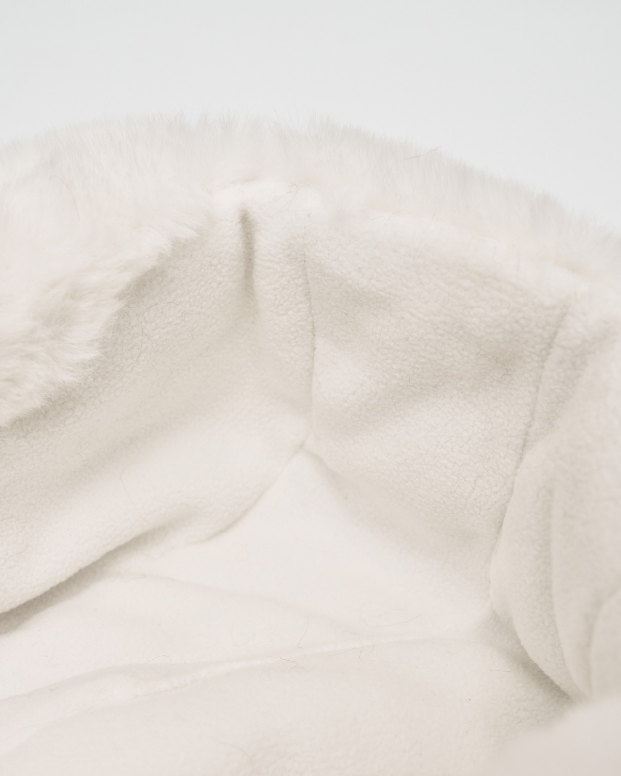 Тёплая шапка-ушанка из экомеха на синтепоне с флисом