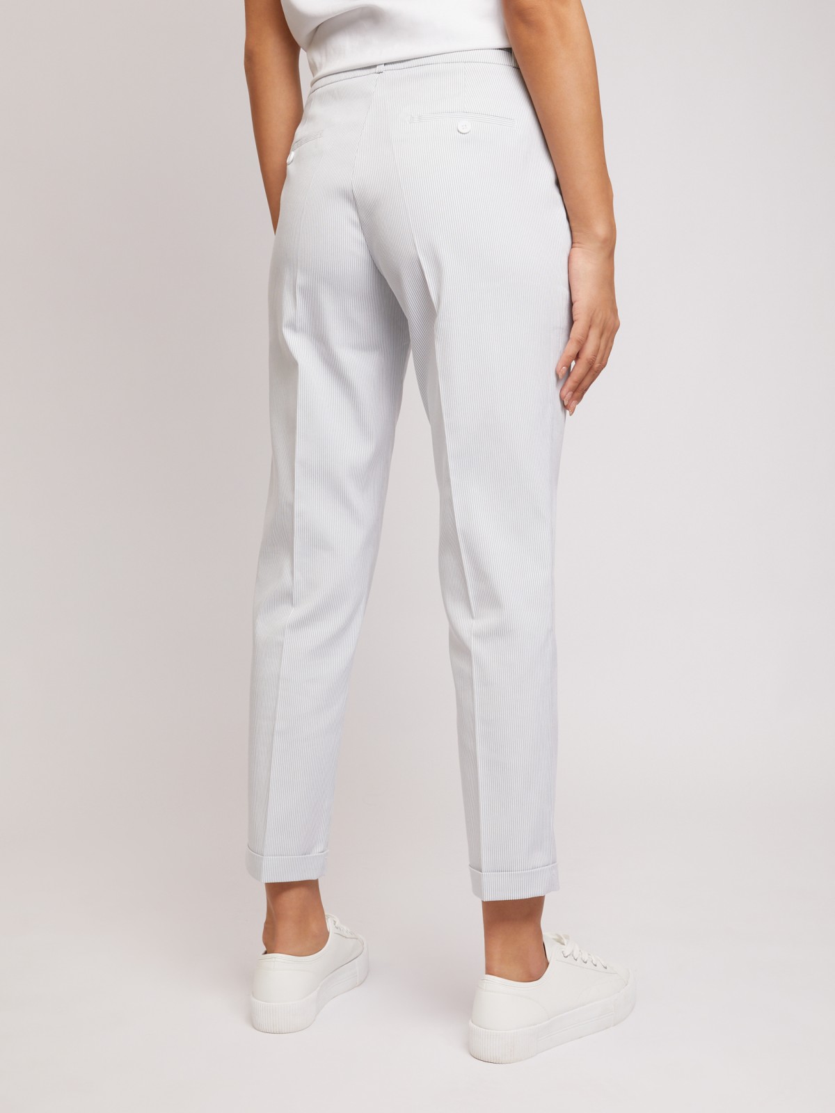 Брюки в тонкую полоску Брюки в тонкую полоску